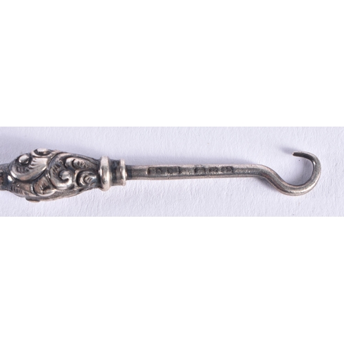 1459 - A PAIR OF ANTIQUE SILVER CASED SCISSORS together with other silver sewing tools. 52 grams overall. (... 