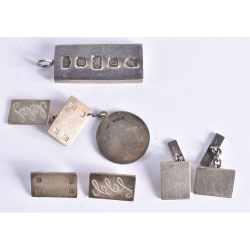 1461 - SILVER CUFFLINKS and a silver ingot. 60 grams. (qty)