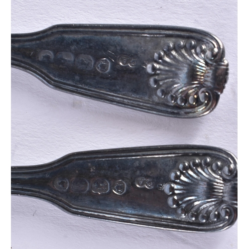 1469 - AN UNUSUAL VICTORIAN NEWCASTLE SILVER SLICE SPOON by Christian John Reid, together with six silver s... 