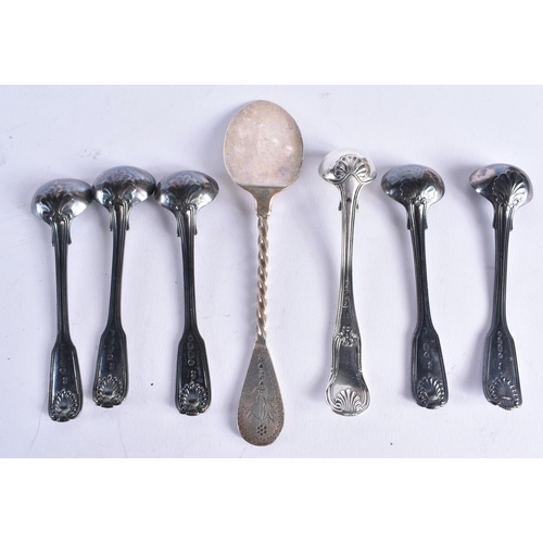 1469 - AN UNUSUAL VICTORIAN NEWCASTLE SILVER SLICE SPOON by Christian John Reid, together with six silver s... 