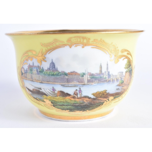 1475 - A 19TH CENTURY MEISSEN OVERSIZED PORCELAIN CUP AND SAUCER painted with views of Dresden and floral s... 