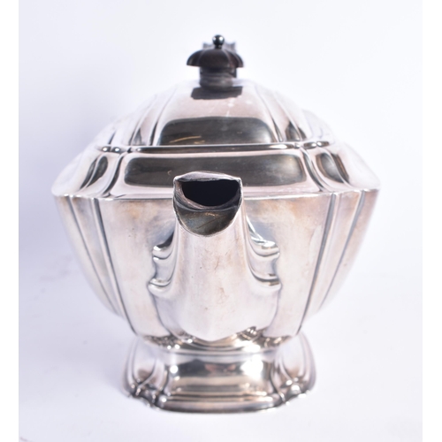 1476 - AN ART DECO SHEFFIELD SILVER TEAPOT. 568 grams. 26 cm wide.