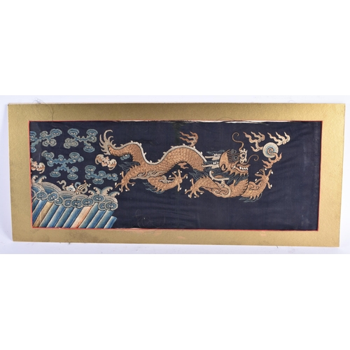 1482 - A 19TH CENTURY CHINESE SILK EMBROIDERED DRAGON PANEL Qing. 62 cm x 28 cm.