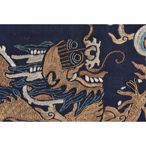 1482 - A 19TH CENTURY CHINESE SILK EMBROIDERED DRAGON PANEL Qing. 62 cm x 28 cm.