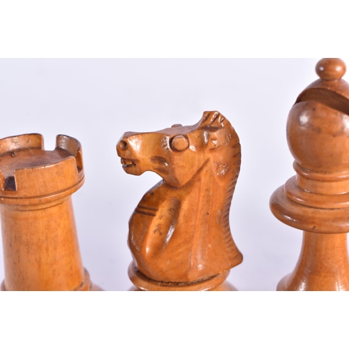 1486 - AN ANTIQUE BOXWOOD AND EBONY CHESSMEN CHESS SET. Largest 9 cm high. (qty)