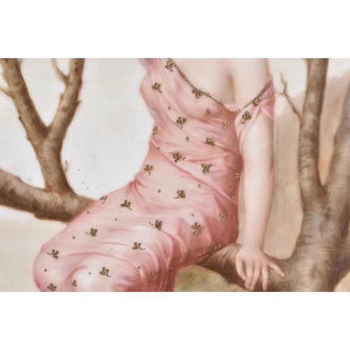 1488 - AN EARLY 20TH CENTURY CONTINENTAL KPM PORCELAIN PLAQUE depicting a female wearing a pink dress upon ... 