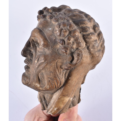 1492 - AN EARLY ANTIQUITY POTTERY VESSEL together with a similar head. Largest 14 cm x 16 cm. (2)