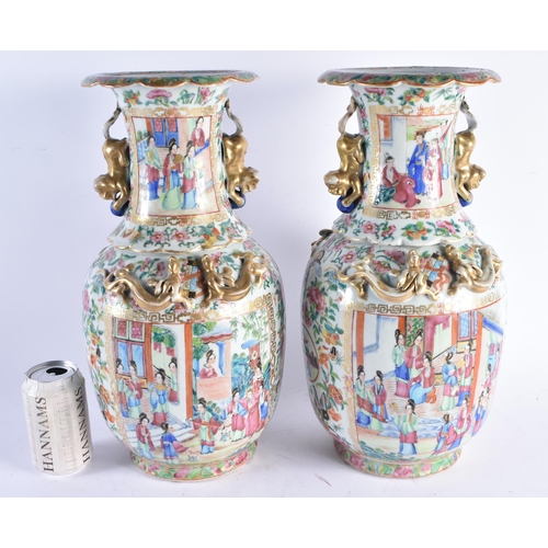 1496 - A PAIR OF 19TH CENTURY CHINESE CANTON FAMILLE ROSE PORCELAIN VASES Qing. 42 cm x 18 cm.