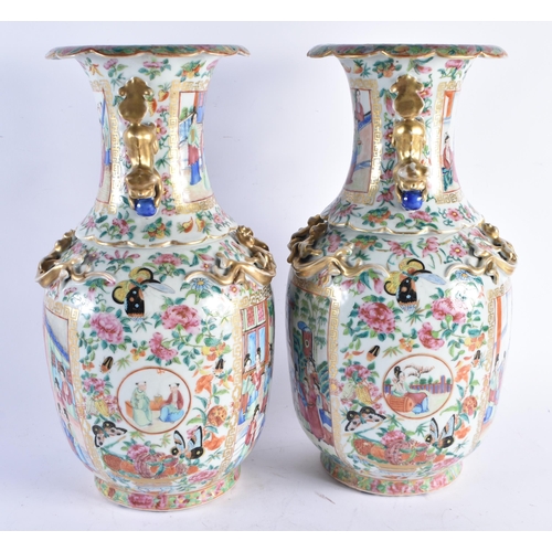 1496 - A PAIR OF 19TH CENTURY CHINESE CANTON FAMILLE ROSE PORCELAIN VASES Qing. 42 cm x 18 cm.