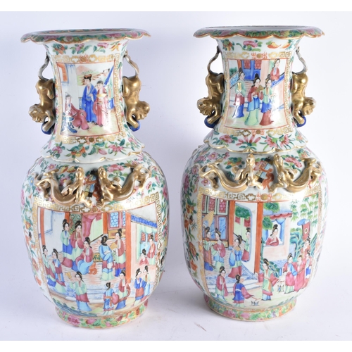 1496 - A PAIR OF 19TH CENTURY CHINESE CANTON FAMILLE ROSE PORCELAIN VASES Qing. 42 cm x 18 cm.