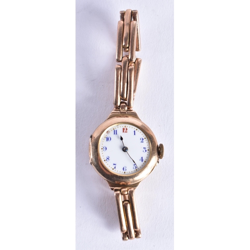 1517 - A VINTAGE 9CT GOLD WATCH with 9ct gold strap. 28.5 grams overall. 3 cm wide inc crown.