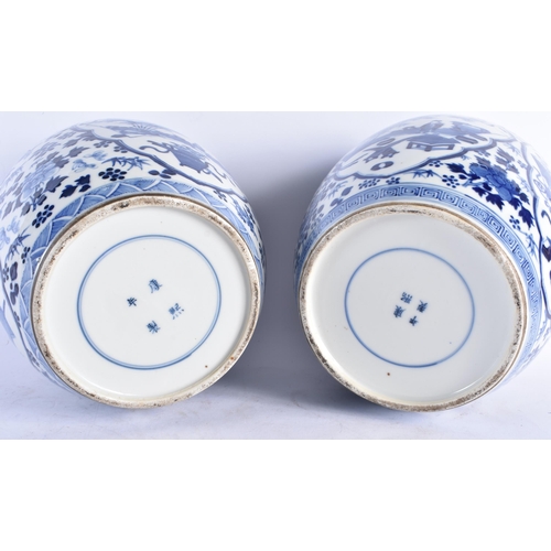 1538 - A LARGE PAIR OF 19TH CENTURY CHINESE BLUE AND WHITE GINGER JARS AND COVERS bearing Kangxi marks to b... 