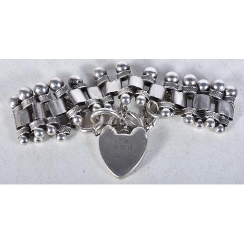 756 - Edwardian Silver Bracelet Conversion Inc. Heart Padlock 22g. Birmingham 1907. 5 cm in diameter.