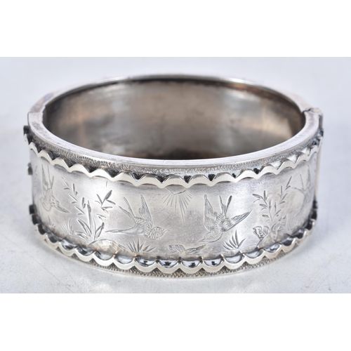 758 - Victorian Sterling Silver Bangle, Etched 31g. Birmingham 1882. 4.5 cm x 5.5 cm.