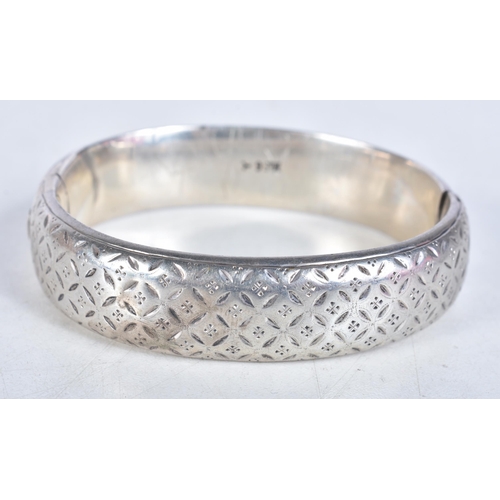 766 - Victorian Sterling Silver Bangle, Etched 29g. 5.5 cm x 6 cm.