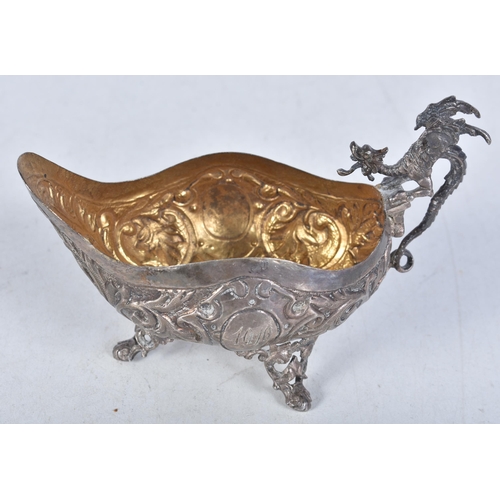 781 - stamped .800 silver cream dish w/ dragon detailed handle. 57.2 grams. 10.75 cm x 7.75 cm.