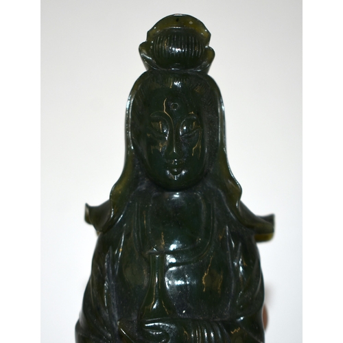 803 - A 19TH CENTURY CHINESE CARVED SPINACH JADE FIGURE OF AN IMMORTAL Qing. 16 cm high.