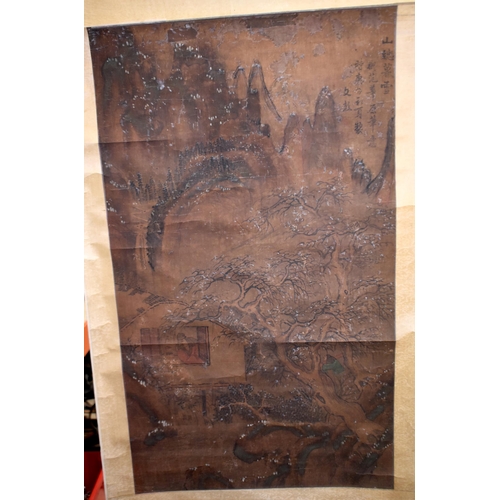 814 - A CHINESE QING DYNASTY PAINTED SILK LANDSCAPE SCROLL depicting a scholar within a landscape. Image i... 