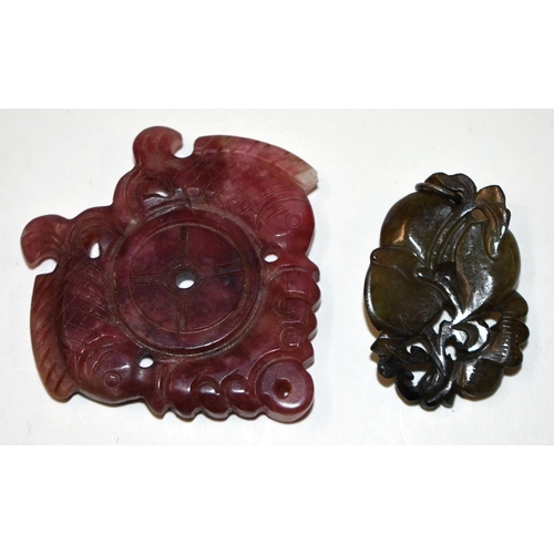 830 - A 19TH CENTURY CHINESE MUTTON JADE PENDANT Qing, together with a tourmaline double fish pendant. Lar... 