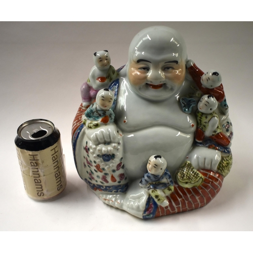 841 - A CHINESE REPUBLICAN PERIOD FAMILLE ROSE PORCELAIN BUDDHA. 28 cm x 22 cm.