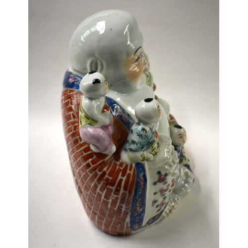 841 - A CHINESE REPUBLICAN PERIOD FAMILLE ROSE PORCELAIN BUDDHA. 28 cm x 22 cm.