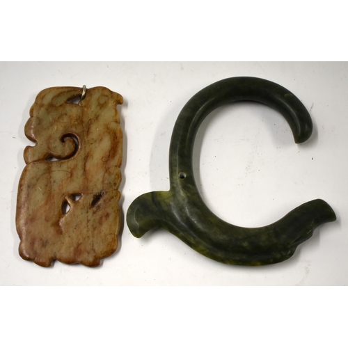 846 - TWO EARLY CHINESE JADE CARVINGS. Largest 12 cm x 10 cm. (2)