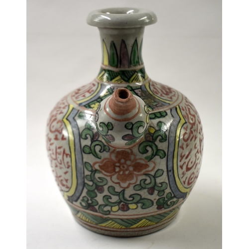 849 - A CHINESE QING DYNASTY ISLAMIC MARKET KENDI painted with Arabic scripture. 25 cm x 18 cm.