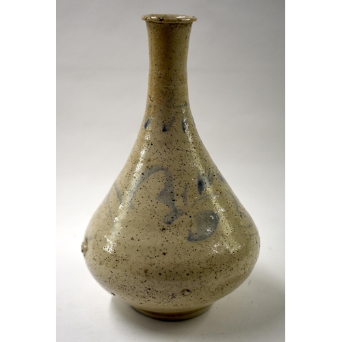 851 - A KOREAN CHOSUN PERIOD BLUE AND WHITE VASE painted with sparse decoration. 26.5 cm high.