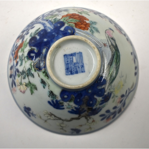 855 - A CHINESE QING DYNASTY BLUE AND WHITE FAMILLE ROSE BOWL bearing Qianlong marks to base. 11.5 cm diam... 