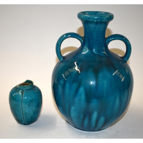 864 - A CHINESE QING DYNASTY TURQUOISE MONOCHROME PORCELAIN VASE together with a smaller vase. Largest 20 ... 