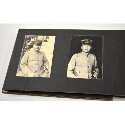 874 - ASSORTED VINTAGE CHINESE AND JAPANESE PHOTOS contained within a silk lined album. Album 27 cm x 18 c... 