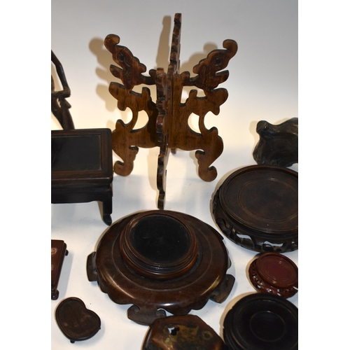 877 - ASSORTED CHINESE AND JAPANESE HARDWOOD STANDS. (qty)