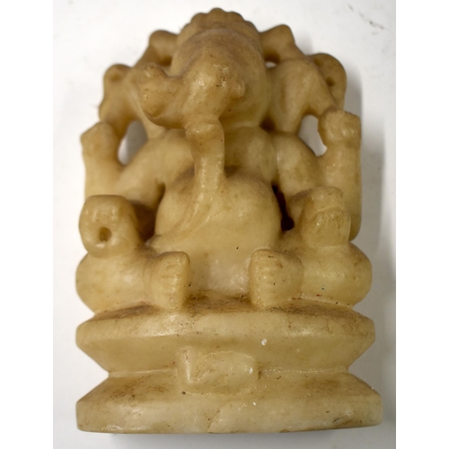 890 - AN EARLY INDIAN CARVED STONE FIGURE OF GANESHA. 17 cm x 9 cm.