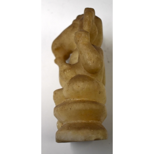 890 - AN EARLY INDIAN CARVED STONE FIGURE OF GANESHA. 17 cm x 9 cm.