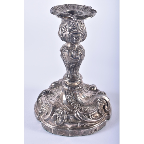 934 - victorian .925 sterling silver filled candlesticks. 879 grams overall. London 1895. 14 cm x 10.5 cm.