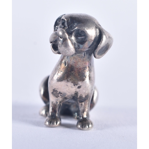 945 - .925 Sterling Silver Miniature Ornaments Inc Cats & Dog 52 grams. Largest 3.5 cm x 3.75 cm. (2)