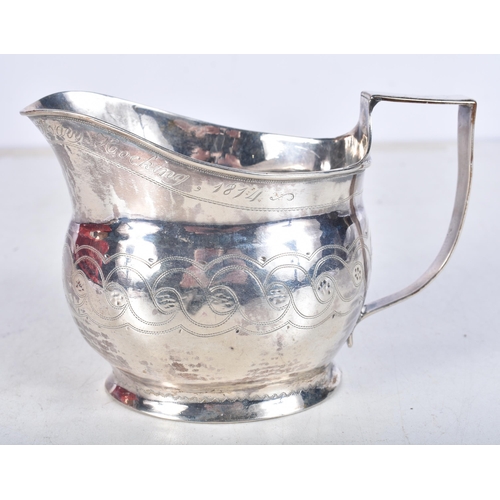 962 - .925 sterling silver georgian cream jug. 107 grams. 8.5 cm x 12.5 cm.