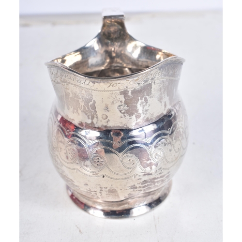 962 - .925 sterling silver georgian cream jug. 107 grams. 8.5 cm x 12.5 cm.