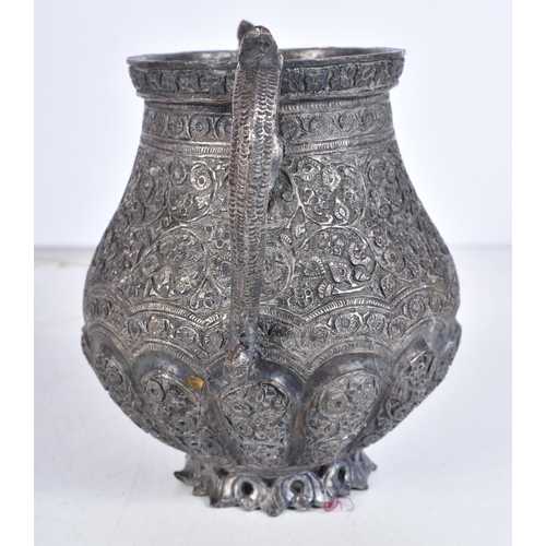 963 - Antique Islamic Heavy Metal Twin Handled Vase / Urn. 738 grams. 14.5 cm x 17 cm.