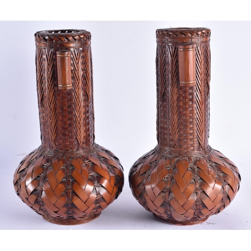 987 - A PAIR OF EARLY 20TH CENTURY JAPANESE MEIJI PERIOD BAMBOO VASE of bulbous form. 30 cm high.