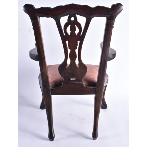 998 - AN ANTIQUE MINIATURE CARVED WOOD DOLL OR CHILDS CHAIR perhaps an apprentice piece. 50 cm x 30 cm.