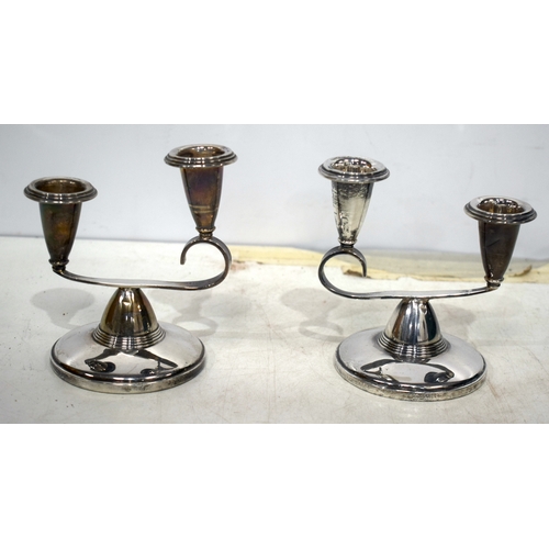 1541 - A pair of English silver candlesticks. 185 grams overall. 13 cm x 11 cm.