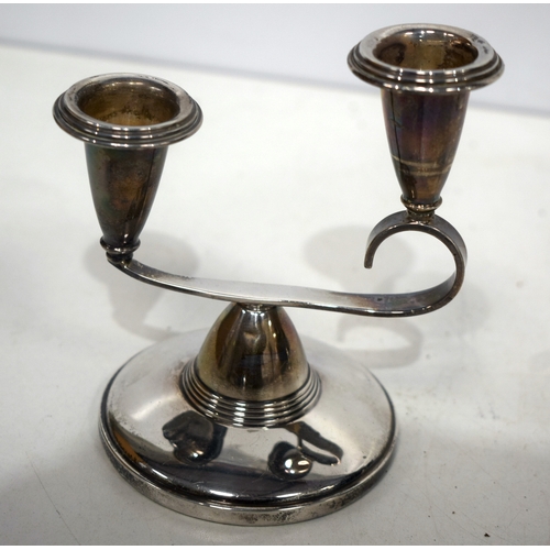 1541 - A pair of English silver candlesticks. 185 grams overall. 13 cm x 11 cm.