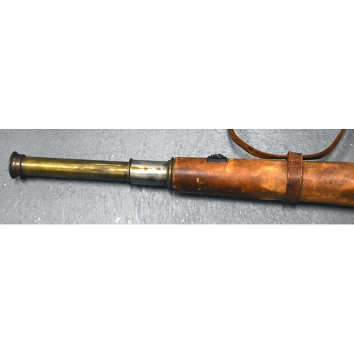 103 - A World War II military brass and leather spotting scope, inscribed 'W Ottway & Co Ltd' and dated 19... 