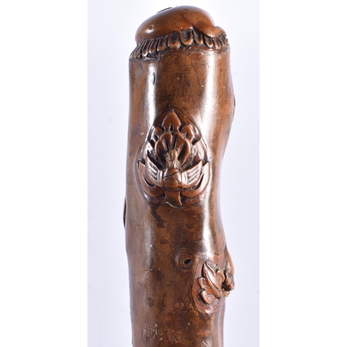 104 - AN 18TH/19TH CENTURY CONTINENTAL CARVED FOLK ART WOOD WALKING CANE formed with grotesque beasts and ... 