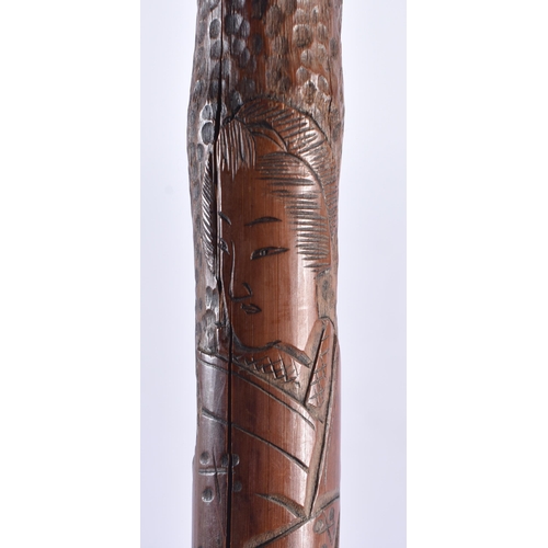 105 - A 19TH CENTURY JAPANESE MEIJI PERIOD CARVED BAMBOO GEISHA WALKING CANE. 86 cm long.