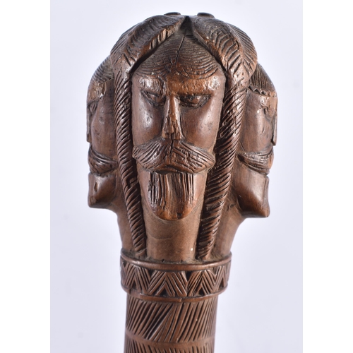 108 - AN 18TH/19TH CENTURY GREEK CARVED WOOD WALKING CANE formed with mask heads. 80 cm long.