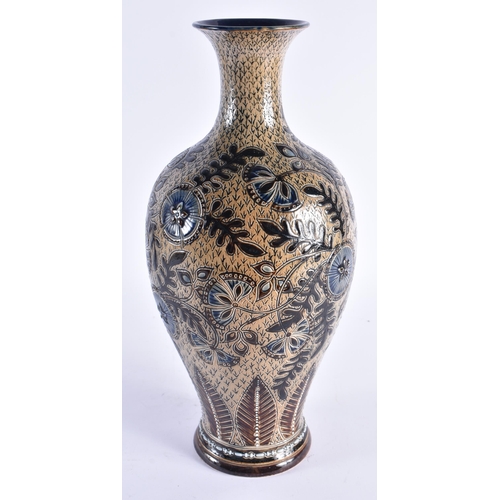 110 - A LARGE DOULTON STONEWARE BALUSTER VASE decorated with roundels and foliage. 38 cm high.