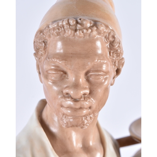 114 - A LARGE 19TH CENTURY HADLEY'S ROYAL WORCESTER BLUSH IVORY FIGURE modelled as a male beside an amphor... 