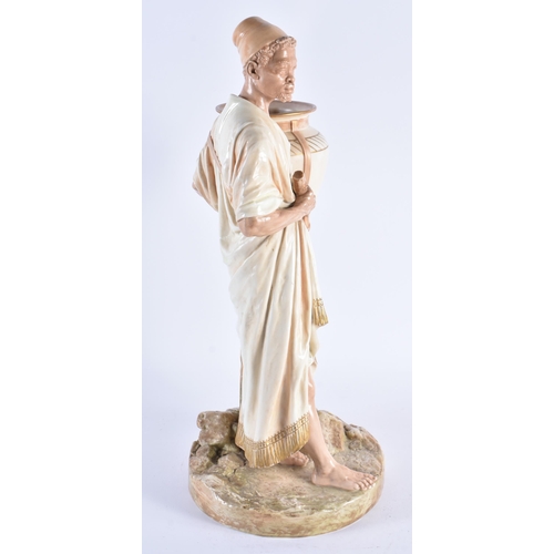 114 - A LARGE 19TH CENTURY HADLEY'S ROYAL WORCESTER BLUSH IVORY FIGURE modelled as a male beside an amphor... 